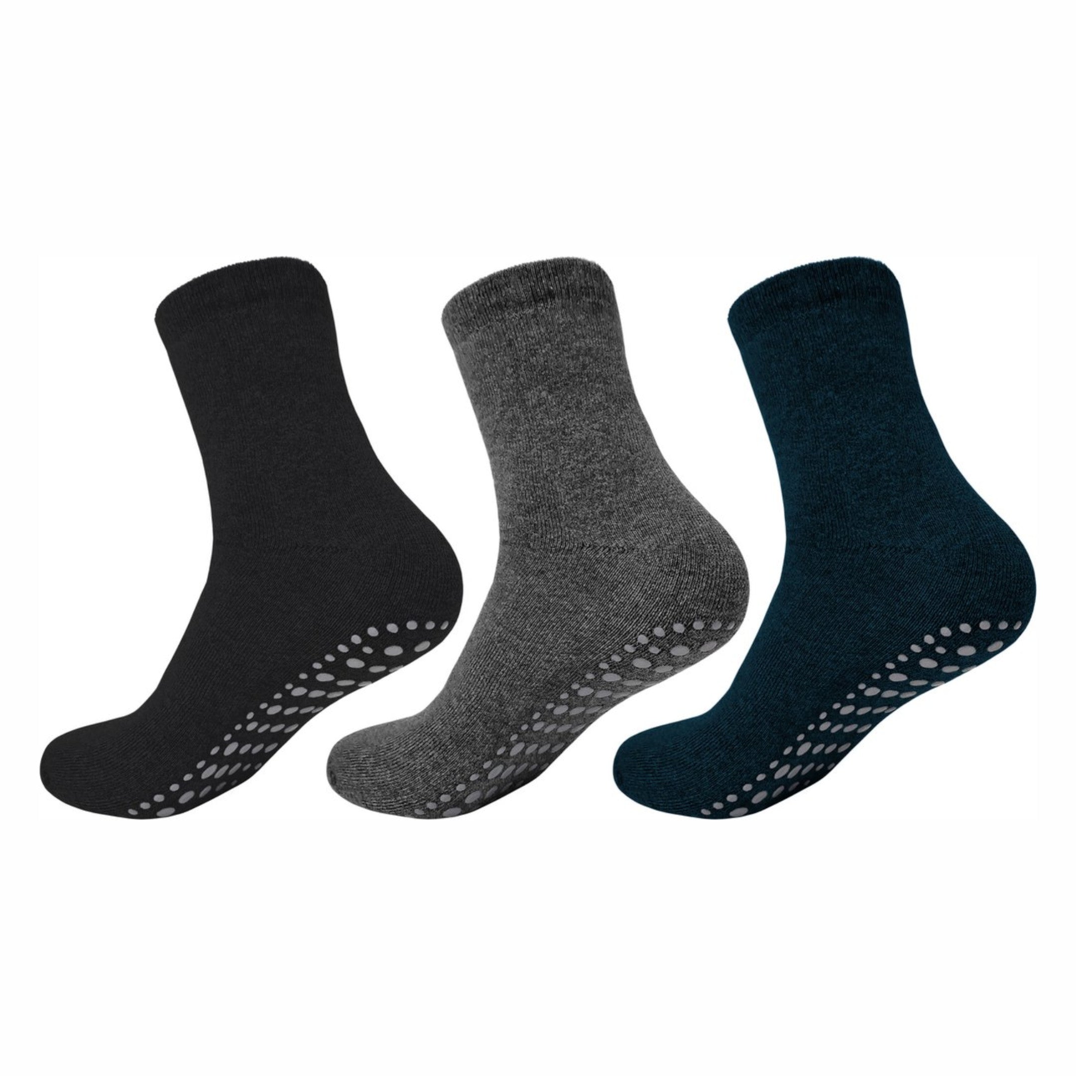 Set van drie Calzera antislip sokken in de kleuren zwart, grijs en blauw, gemaakt van badstof met ABS-materiaal aan de onderkant voor optimale grip.
