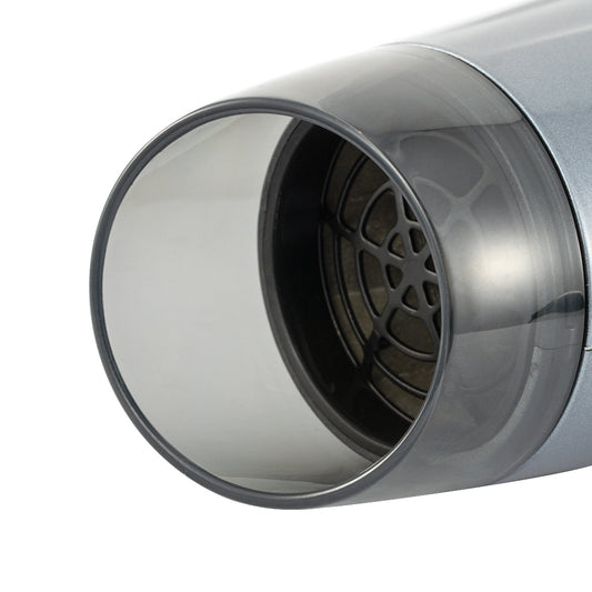 Detailfoto van de voorkant van de Reisföhn 1600W, die het stijlvolle ontwerp en de luchtuitlaatopening toont, ideaal voor het snel en efficiënt drogen van haar.